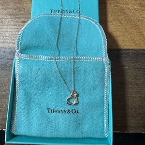 Tiffany / Elsa Peretti Open Heart Pendant
Sterling silver, 18k gold, 16” chain